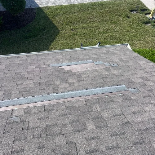 Roof inspection in Florida, checking roof health after salt‑spray storms.