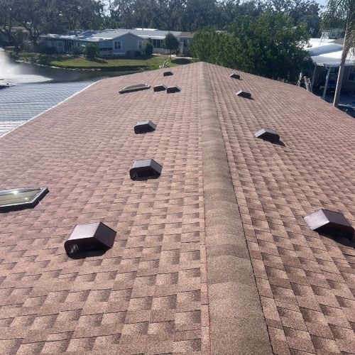 Completed roof replacement on a Kensington Park, FL home, showing new shingles installed and a finished, professional result.