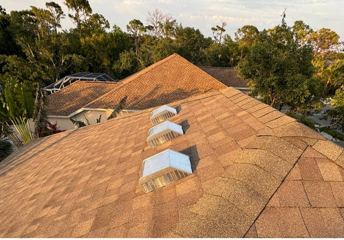 A roofing contractor’s completed project in Port Charlotte, FL, featuring expert craftsmanship and a durable, long-lasting roof.